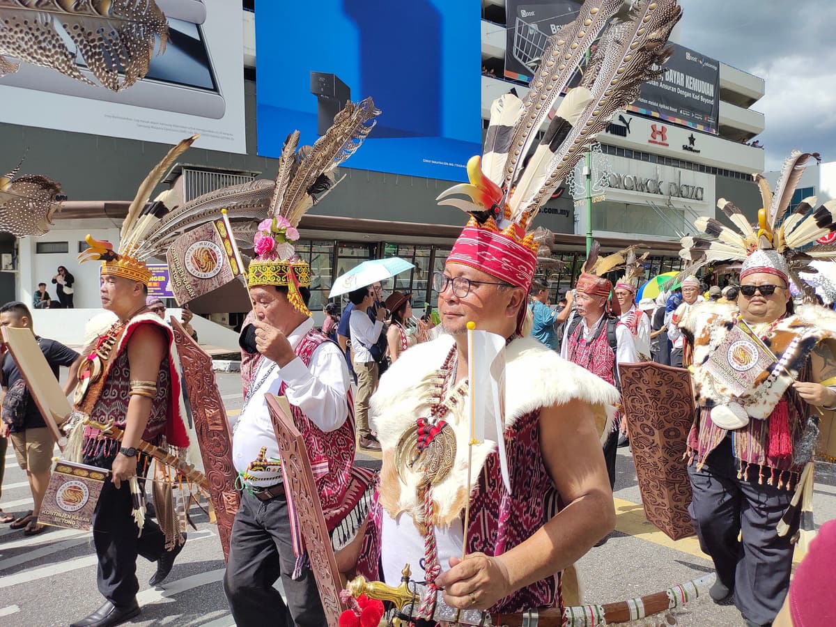 Dayak men celebrating Gawai on the streets of Kuching Sarawak