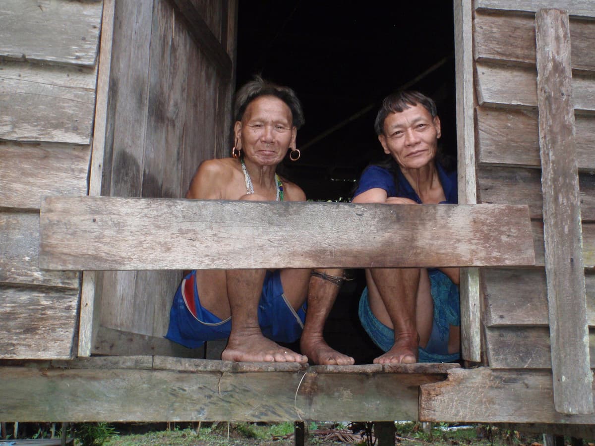 Penan elders in a wooden house