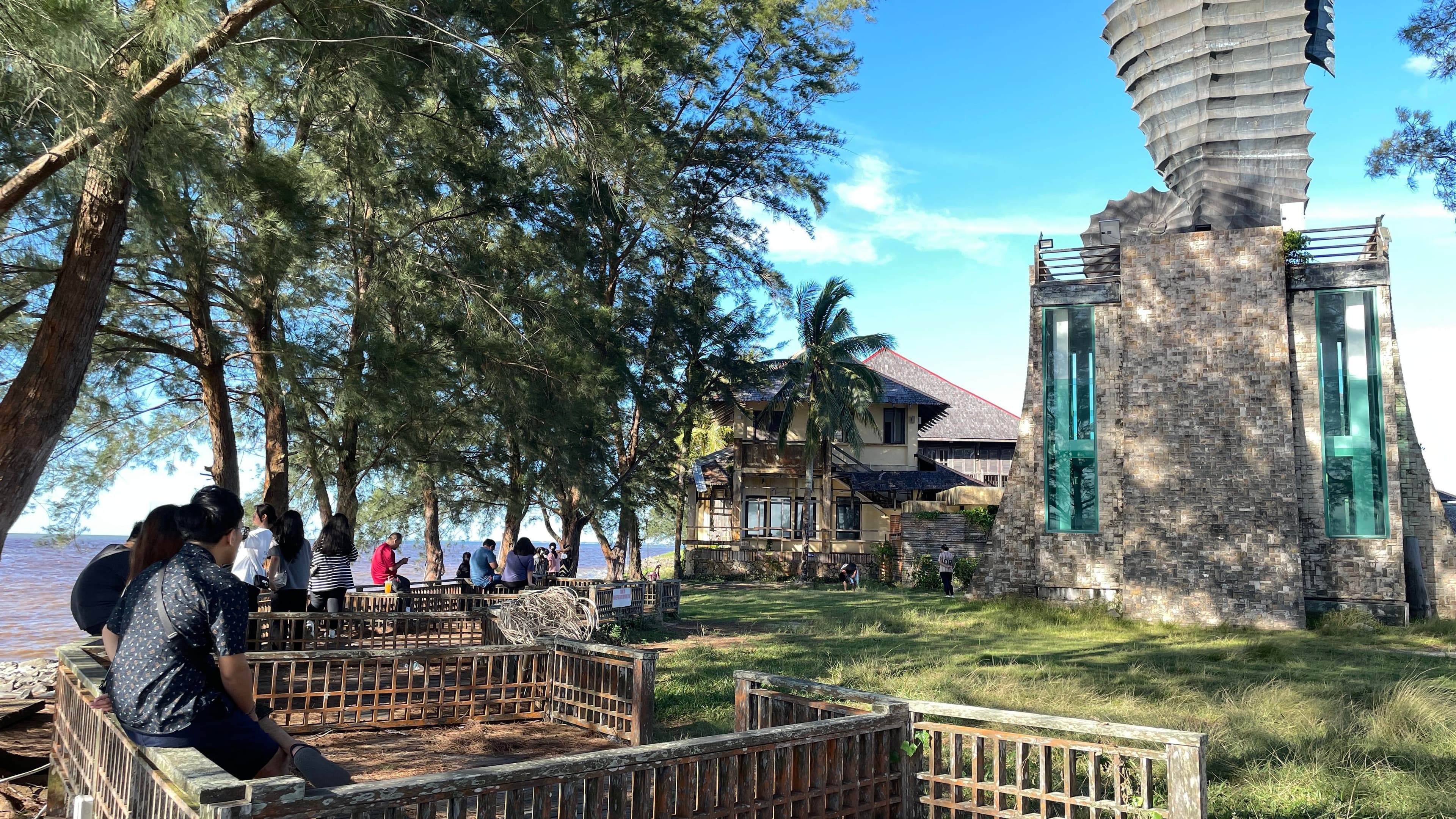 edge of coco cabana where the miri seahorse lighthouse is located with the wooden decks next to it.